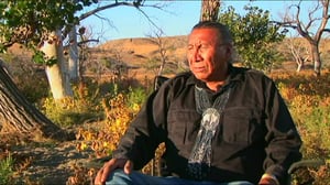 Chief Arvol Looking Horse sitting outside reflecting on nature.
