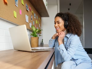 African American adult female on a web video call.